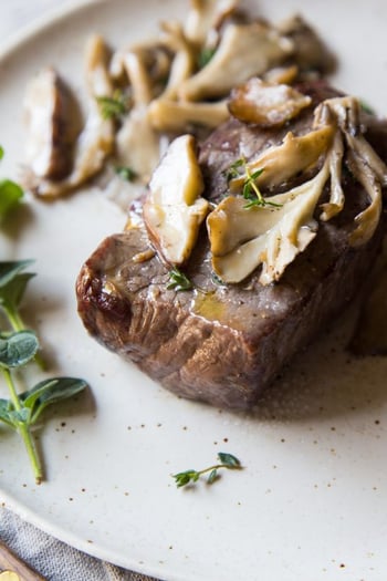 Steak Topped with Sautéed Specialty Mushrooms